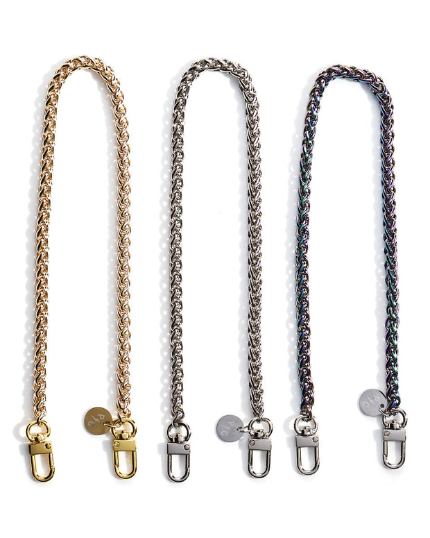 Product shot of gold, silver, and rainbow irridecent face mask chain necklace holders