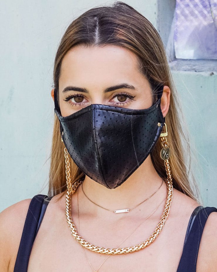 Stylish gold long necklace chain worn with face mask 